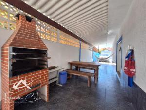 Casa com piscina no Indaiá em Bertioga - Para 8 pessoas