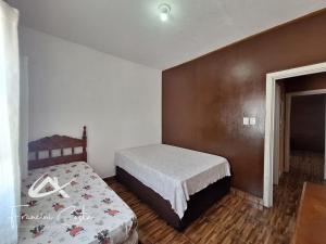Casa com piscina no Indaiá em Bertioga - Para 8 pessoas
