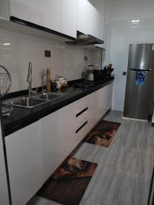 celestial stays two bedroom apartment with well equipped gym swimming pool and, ample parking space and proximity to major shopping malls