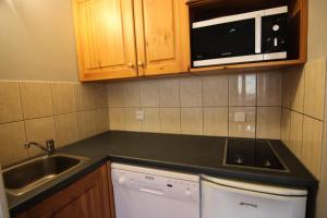 Résidence Olympic - VAL THORENS 2 PIECES 4 PERSONNES FACE AU SUD ET AUX PISTES MAE-8744