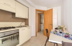2 Bedroom Lovely Apartment In Porto Cesareo
