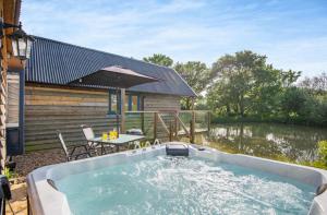 The Boathouse by Plush Huts