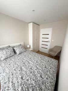 WHITE APARTMENTS - Wczasowa