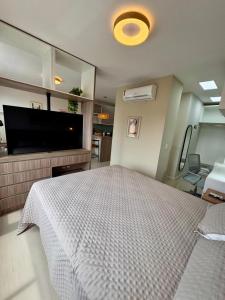 1202 Flat Urbano com Piscina Infinita na Cobertura