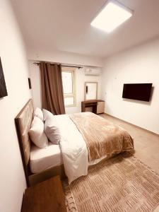 New Cairo GEM 1 bedroom apartment with kitchen AUC and EDNC area