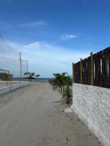 Chalé Pé na areia
