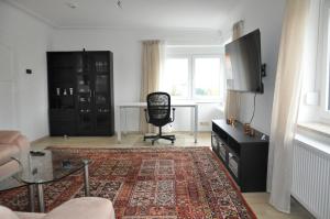 Apartment Karin - Modern ausgestattet und ideal für Gruppen bis 6 Personen und Hund, egal ob Familie, Kollegen oder Freunde, 85qm mit Terasse und eigenem Stellplatz