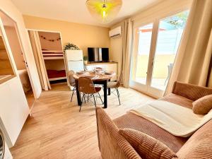 Le cocon de Sète - T2 cabine cosy, grande terrasse rez de jardin, clim, parking proche plage