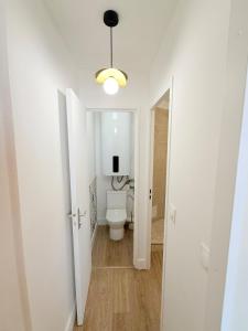 Le cocon de Sète - T2 cabine cosy, grande terrasse rez de jardin, clim, parking proche plage