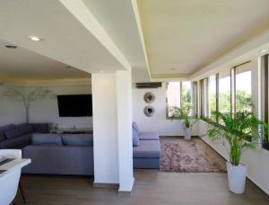 CONDO ideal que combina lujo, comodidad y la belleza del Caribe