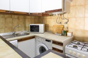 NOVO! Apartamento junto à praia com piscina