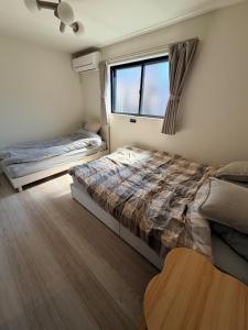 Tokyo Skytree View Single family Home for Entire Rental 2 Minutes to the Station 4 Bedrooms 7 Beds Max 10 People Direct Access to Narita and Haneda Airports 107 square Sleeps 10