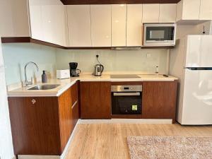 Luxury 1bedroom apt connected to Millennium Resort
