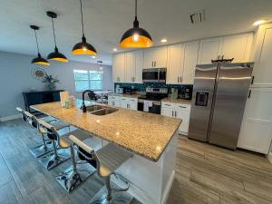 Soak up the Sun - Saltwater pool, spacious fenced-in backyard, home