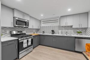 Simple and Stylish 1BR Basement Suite Near U of A