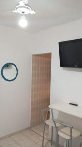 Apartamento em Santos na ponta da praia á beira mar