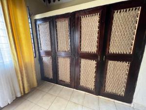 Luxurious 3-Bedroom Holiday House with Pool Access in Diani Beach