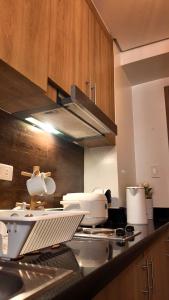 Cozy Condo near MOA & NAIA - PS4, Netflix, Wi-Fi