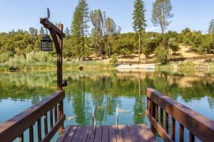 Oak Pond Retreat Stocked pondpool tableBBQ GrillEV Charger