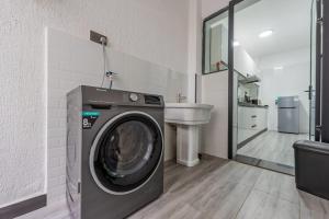 classy executive two bedroom apartment with fully equipped gym ample parking space , swimming pool children playing ground and amazing scenic views and close proximity to major shopping malls and restaurants