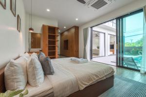 V226 Peaceful 4BR Pool Villa Near Bang Tao Beach