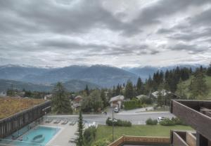 Antares 310 au centre a Anzere avec vue sur les Alpes