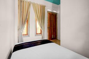 OYO 95170 Purnama Baru Syariah