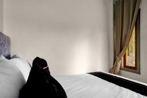 OYO 95170 Purnama Baru Syariah