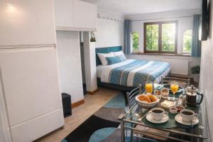 Studio PREMIUM cosy classé 24m2, 2 lits, proche centre, Netflix, Climatisation, Parking privé