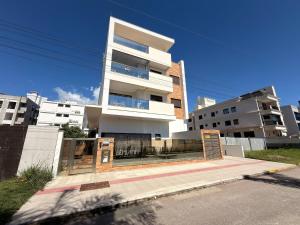 Residencial Benjamin - Apartamento garden a 2 minutos da praia de Palmas, com espaços internos e externos amplos para até 8 pessoas