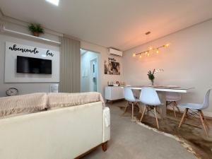 Residencial Benjamin - Apartamento garden a 2 minutos da praia de Palmas, com espaços internos e externos amplos para até 8 pessoas