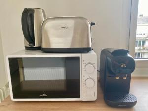 Studio scandinave Balcon et ascenseur