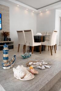 Casa confortável com varanda gourmet e 3 quartos com ar