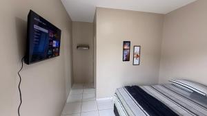 Suíte aconchegante privativa1