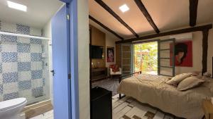 Suite com jardim privativo - Casa das Bromélias - 02