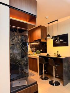 The Urban Hideout - 1 BR Cozy Studio in Marina Spatial Condo Dumaguete City