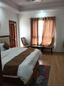 Kamal Residency by Uk season