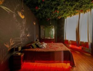 Jungle Love room avec Balnéo & Table de Massage
