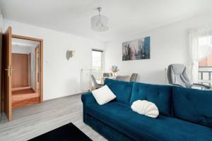 Charming Apartment with Parking and Balcony Near the City Centre by Noclegi Renters
