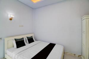 Hotel O near Mangusada Hospital formerly Rare Home Cozy Stay Premier 2