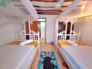 Elnas Haven Diani Palms - 5min walk to the beach, serene and culinary services