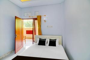 Hotel O near Mangusada Hospital formerly Rare Home Cozy Stay Premier 2