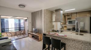 Flat com Limpeza Diária, Piscina e Praia - DL1804