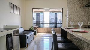 Flat com Limpeza Diária, Piscina e Praia - DL1804