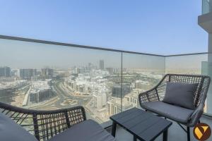 Vogue Vacation Homes, Arjan Skyz by Danube near Miracle Garden, One bedroom Apartment with Balcony and City View, Access toAmenities