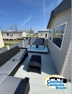 Fantasy Island Resort - The Pearl F10, with Hot Tub - Coastal Caravan Breaks