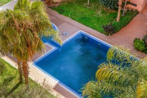 Appartement Luxe 2 Chambres avec Balcon, Piscine, Guéliz Essafae