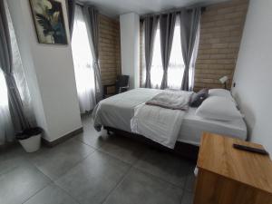 Andes Coliving - Cerca Aeropuerto JMC - Check-in Autónomo