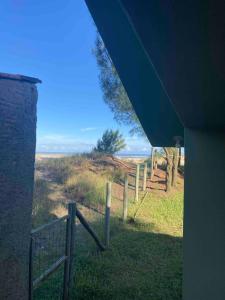 Casa de fundos as dunas e ao mar