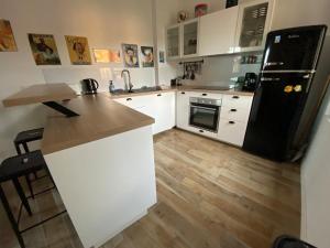 Appartement au cœur du faubourg - Atelier Marin